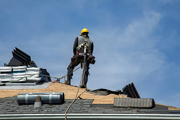 Professional Roofing technician working in Hurley, NY